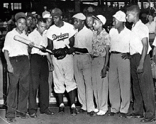 Jackie Robinson with Charlotte newspaper carriers