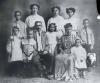 The Tate Family, c. 1910. Left to right, front row: Aurelia (Midge), William, Thaddeus L. Tate, Sr., Mildred, Mary Butler Tate, Talmadge, Edwin. Second Row: Thaddeus Jr., Maggie, Estelle, Cora. Inset: Guion. LAURA M. BOOTON.